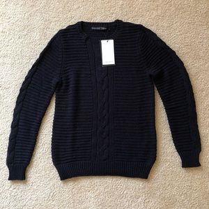 Navy blue cable knit sweater